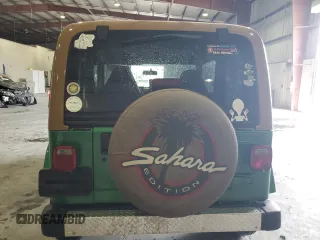 1998 Jeep Wrangler Sahara z VIN 1J4FY49S6WP730035, wystawiony jako Copart lot #59100505 z przebiegiem 225 354 mil mil oraz Szkoda całkowita • Salvage title. Historia ofert i sprzedaży dostępna na DreamBid. Obrazek 6.