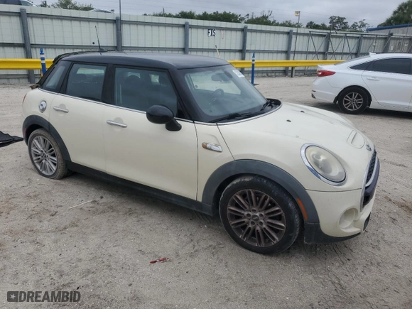 2015 MINI Cooper Hardtop 4 Door S with VIN WMWXU3C59F2B56806, listed as a Copart auction lot 52383055 with 147,817 mi miles and Salvage Title. Bid and sale history available at carsss.com. Image 4.