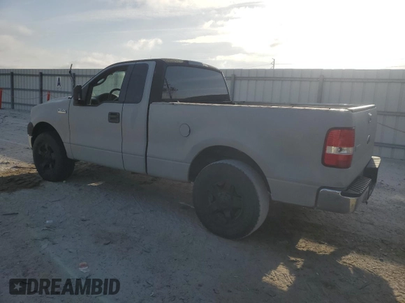 2005 Ford F-150 XL with VIN 1FTRF12235NC10435, listed as a Copart auction lot 57311935 with 249,847 mi miles and Salvage title. Bid and sale history available at DreamBid. Image 2.