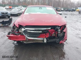 2015 Ford Taurus Limited with VIN 1FAHP2J89FG110114, listed as a IAAI auction lot 41568641 with 153,579 mi miles. Bid and sale history available at carsss.com. Image 6.
