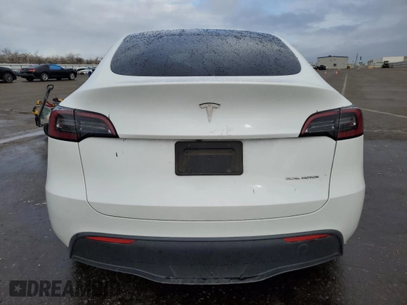 2023 Tesla Model Y Long Range z VIN 7SAYGAEE5PF743079, wystawiony jako Copart lot #45570655 z przebiegiem 46 145 mil mil oraz Szkoda całkowita • Salvage title. Historia ofert i sprzedaży dostępna na DreamBid. Obrazek 6.