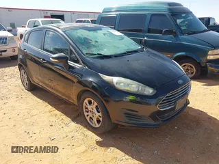 2014 Ford Fiesta SE z VIN 3FADP4EJ9EM102168, wystawiony jako IAAI lot #42464461 z przebiegiem 149 847 mil mil oraz . Historia ofert i sprzedaży dostępna na DreamBid. Obrazek 1.
