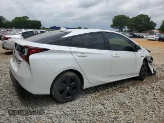 2021 Toyota Prius L Eco with VIN JTDKAMFU4M3129824, listed as a Copart auction lot 57788635 with 38,556 mi miles and Salvage title. Bid and sale history available at DreamBid. Image 3.