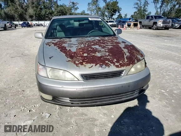 1997 Lexus ES 300 Luxury Sport Sdn with VIN JT8BF22G9V0025028, listed as a Copart auction lot 88229995 with 0 mi miles and Salvage Title. Bid and sale history available at carsss.com. Image 10.