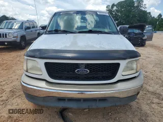 2000 Ford F-150 XL with VIN 1FTRX17L4YNB99870, listed as a Copart auction lot 60287985 with Not provided miles and Salvage title. Bid and sale history available at DreamBid. Image 5.