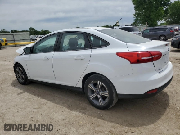 2018 Ford Focus SE with VIN 1FADP3F27JL264670, listed as a Copart auction lot 57184815 with 35,187 mi miles and Salvage title. Bid and sale history available at DreamBid. Image 2.