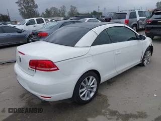 2012 Volkswagen Eos Komfort with VIN WVWBW7AH6CV004193, listed as a IAAI auction lot 42194925 with 71,401 mi miles and . Bid and sale history available at DreamBid. Image 4.