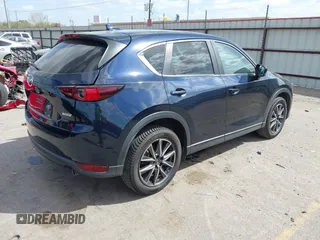 2018 Mazda CX-5 Touring with VIN JM3KFACM3J1370129, listed as a IAAI auction lot 41829027 with 71,305 mi miles. Bid and sale history available at carsss.com. Image 4.