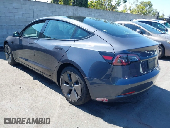 2023 Tesla Model 3 z VIN 5YJ3E1EAXPF710024, wystawiony jako IAAI lot #41228608 z przebiegiem 10 481 mil mil oraz . Historia ofert i sprzedaży dostępna na DreamBid. Obrazek 3.