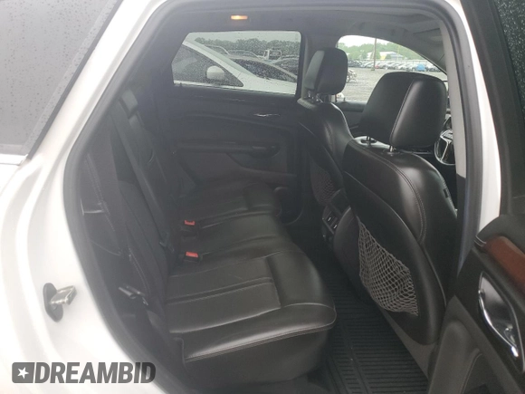 2013 Cadillac SRX Performance Collection with VIN 3GYFNHE34DS597871, listed as a Copart auction lot 56470795 with 208,504 mi miles and Salvage title. Bid and sale history available at DreamBid. Image 11.