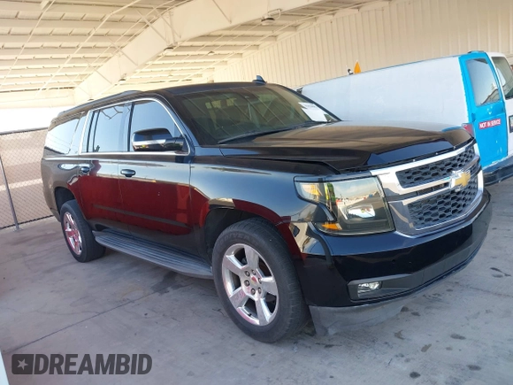 2016 Chevrolet Suburban LT with VIN 1GNSCHKC0GR111778, listed as a IAAI auction lot 42028882 with 61,398 mi miles. Bid and sale history available at carsss.com. Image 13.