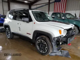 2015 Jeep Renegade Trailhawk with VIN ZACCJBCT8FPB78351, listed as a Copart auction lot 64036095 with 127,784 mi miles and Salvage title. Bid and sale history available at DreamBid. Image 4.