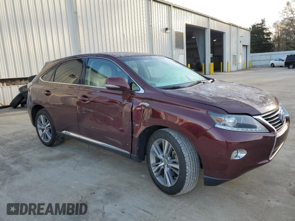 2015 Lexus RX 450h with VIN 2T2ZB1BA0FC001074, listed as a Copart auction lot 88503295 with 188,053 mi miles and Salvage Title. Bid and sale history available at DreamBid. Image 4.