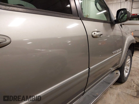 2004 Toyota Tundra SR5 with VIN 5TBDT44104S441271, listed as a IAAI auction lot 41823831 with 296,637 mi miles and . Bid and sale history available at DreamBid. Image 22.