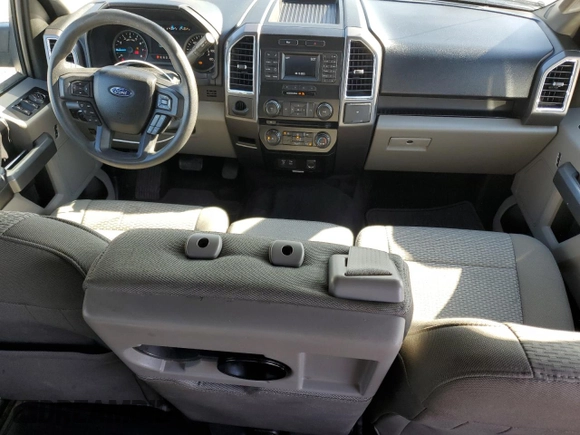 2015 Ford F-150 XLT with VIN 1FTEW1C88FKD74865, listed as a Copart auction lot 48251125 with 215,845 mi miles and Salvage Title. Bid and sale history available at carsss.com. Image 8.