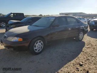 2001 Mazda 626 LX with VIN 1YVGF22D315215931, listed as a Copart auction lot 45399205 with 46,858 mi miles and Clean Title. Bid and sale history available at carsss.com. Image 1.