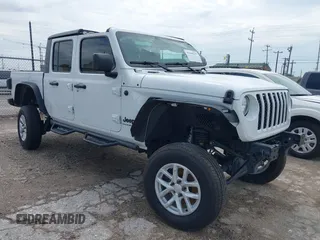 2023 Jeep Gladiator Sport S с VIN 1C6HJTAGXPL579320, выставлен на аукционе IAAI как лот 42469237 с пробегом 30 635 миль миль и . История ставок и продаж доступна на DreamBid. Изображение 1.