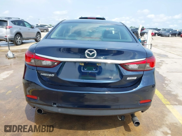 2015 Mazda 6 i Sport with VIN JM1GJ1U52F1201571, listed as a IAAI auction lot 42096344 with 88,290 mi miles and . Bid and sale history available at DreamBid. Image 16.