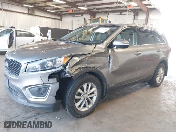 2016 Kia Sorento LX with VIN 5XYPGDA33GG047263, listed as a IAAI auction lot 41772680 with 146,683 mi miles. Bid and sale history available at carsss.com. Image 2.