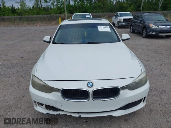 2015 BMW 3 Series 328i with VIN WBA3A5C50FF608327, listed as a IAAI auction lot 42136156 with 213,945 mi miles. Bid and sale history available at carsss.com. Image 12.