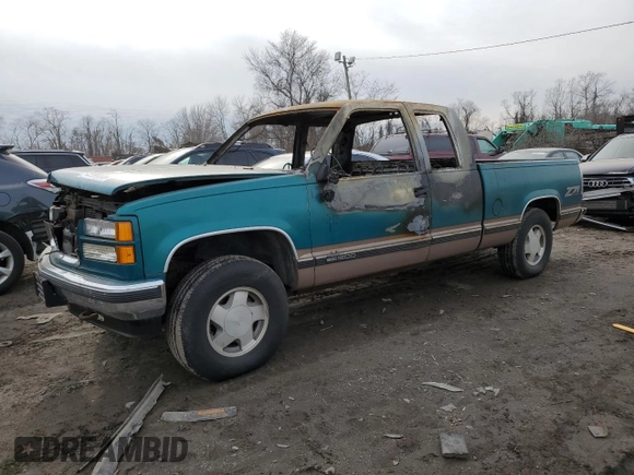 1995 GMC Sierra 1500 z VIN 2GTEK19K0S1570324, wystawiony jako Copart lot #43065205 z przebiegiem Nie podano mil oraz Szkody całkowita. Historia ofert i sprzedaży dostępna na DreamBid. Obrazek 1.