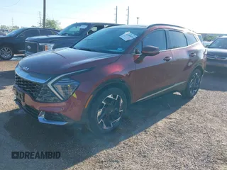 2023 Kia Sportage SX-Prestige with VIN 5XYK53AF4PG114795, listed as a IAAI auction lot 41968650 with 19,880 mi miles and . Bid and sale history available at DreamBid. Image 2.