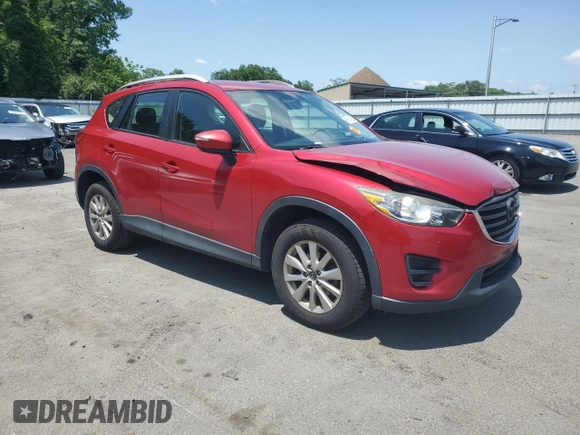 2016 Mazda CX-5 Sport with VIN JM3KE4BY3G0765905, listed as a Copart auction lot 61874165 with 134,546 mi miles and Salvage title. Bid and sale history available at DreamBid. Image 4.