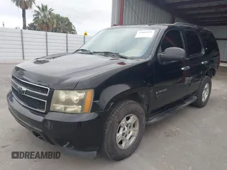 2007 Chevrolet Tahoe LS z VIN 1GNFC13C37J395803, wystawiony jako IAAI lot #42068163 z przebiegiem 273 156 mil mil oraz . Historia ofert i sprzedaży dostępna na DreamBid. Obrazek 2.