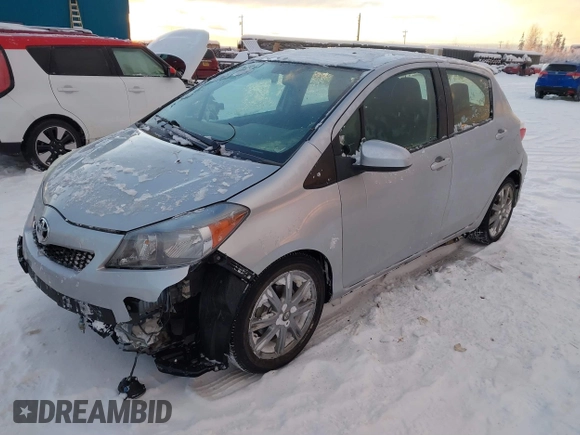 2012 Toyota Yaris L with VIN JTDKTUD34CD506388, listed as a IAAI auction lot 41014347 with 54,427 mi miles. Bid and sale history available at carsss.com. Image 2.