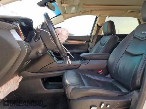 2018 Cadillac XT5 Luxury FWD with VIN 1GYKNCRS7JZ240881, listed as a Copart auction lot 58334075 with 149,014 mi miles and Salvage title. Bid and sale history available at DreamBid. Image 7.