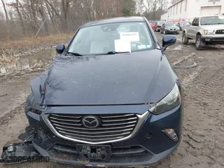 2017 Mazda CX-3 Grand Touring with VIN JM1DKFD75H0179167, listed as a IAAI auction lot 41980243 with 69,076 mi miles. Bid and sale history available at carsss.com. Image 12.