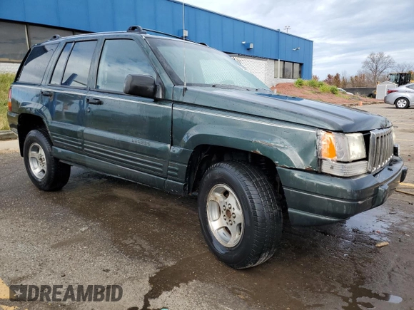 1996 Jeep Grand Cherokee Laredo with VIN 1J4GZ58S4TC281689, listed as a Copart auction lot 78466524 with 0 mi miles and Salvage Title. Bid and sale history available at carsss.com. Image 4.