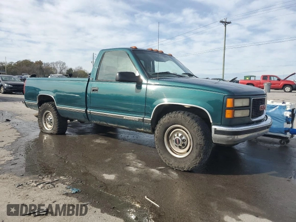 1997 GMC Sierra 1500 with VIN 1GTGC24JXVE524979, listed as a Copart auction lot 79087634 with 170,567 mi miles and Salvage Title. Bid and sale history available at DreamBid. Image 4.
