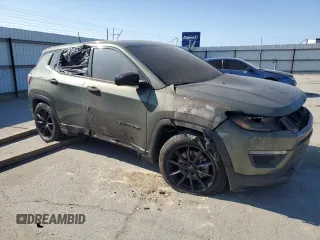 2019 Jeep Compass Sport with VIN 3C4NJCAB5KT731193, listed as a Copart auction lot 57356565 with Not provided miles and Salvage title. Bid and sale history available at DreamBid. Image 4.