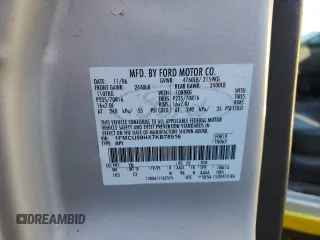 2007 Ford Escape Hybrid z VIN 1FMCU59HX7KB78516, wystawiony jako Copart lot #88585615 z przebiegiem 440 082 mil mil oraz Czysty tytuł • Clean title. Historia ofert i sprzedaży dostępna na DreamBid. Obrazek 13.