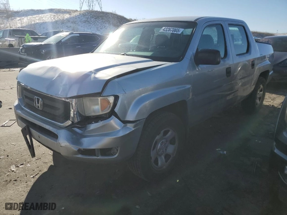 2010 Honda Ridgeline RT with VIN 5FPYK1F28AB008613, listed as a Copart auction lot 43267065 with 145,405 mi miles and Salvage Title. Bid and sale history available at carsss.com. Image 1.