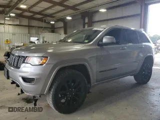 2017 Jeep Grand Cherokee Altitude with VIN 1C4RJFAG9HC772705, listed as a Copart auction lot 61562925 with 184,004 mi miles and Salvage title. Bid and sale history available at DreamBid. Image 1.