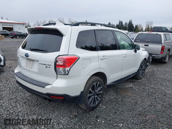 2018 Subaru Forester Premium with VIN JF2SJGEC4JH597210, listed as a IAAI auction lot 41904798 with 93,790 mi miles. Bid and sale history available at carsss.com. Image 4.