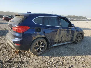 2017 BMW X1 sDrive28i with VIN WBXHU7C39H5H35490, listed as a Copart auction lot 75499974 with 0 mi miles and Salvage Title. Bid and sale history available at carsss.com. Image 3.