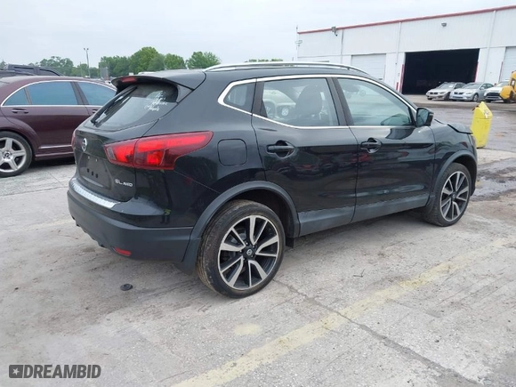 2018 Nissan Rogue Sport SV with VIN JN1BJ1CR5JW201321, listed as a IAAI auction lot 41852934 with 89,115 mi miles. Bid and sale history available at carsss.com. Image 4.