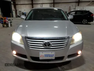 2009 Toyota Avalon XL with VIN 4T1BK36B69U348772, listed as a Copart auction lot 84166684 with 143,349 mi miles and Salvage Title. Bid and sale history available at carsss.com. Image 5.