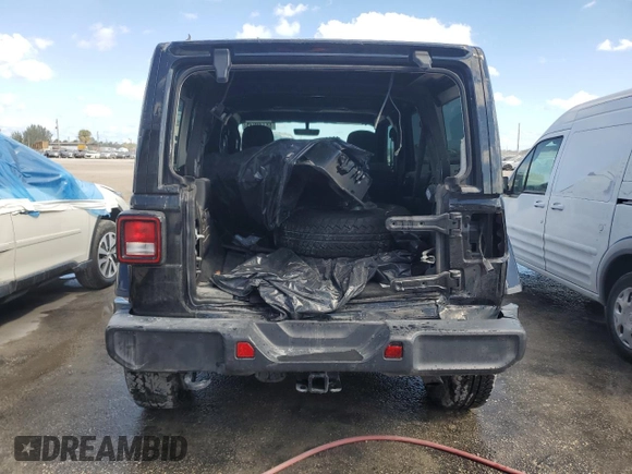 2020 Jeep Wrangler Unlimited Sahara Altitude with VIN 1C4HJXEGXLW292367, listed as a Copart auction lot 88130035 with 52,838 mi miles and Salvage title. Bid and sale history available at DreamBid. Image 6.