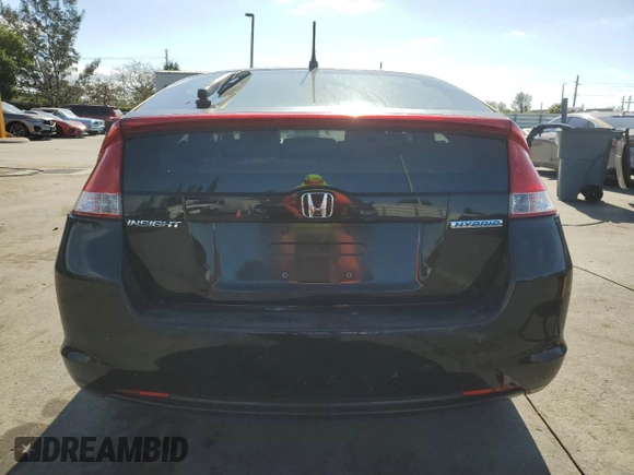 2010 Honda Insight LX with VIN JHMZE2H50AS009869, listed as a Copart auction lot 53031515 with 194,860 mi miles and Salvage Title. Bid and sale history available at DreamBid. Image 6.