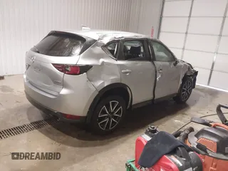 2018 Mazda CX-5 Touring with VIN JM3KFBCM7J0347769, listed as a IAAI auction lot 41611985 with 158,579 mi miles. Bid and sale history available at carsss.com. Image 4.