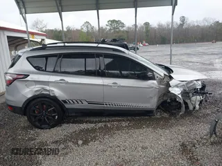 2018 Ford Escape SE z VIN 1FMCU9GD1JUB35184, wystawiony jako IAAI lot #41611285 z przebiegiem 142 267 mil mil oraz . Historia ofert i sprzedaży dostępna na DreamBid. Obrazek 14.