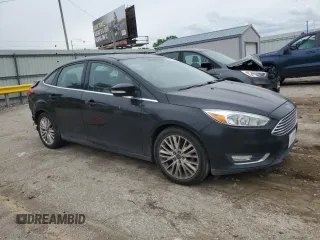 2017 Ford Focus Titanium with VIN 1FADP3J23HL218867, listed as a Copart auction lot 55417305 with 98,710 mi miles and Salvage title. Bid and sale history available at DreamBid. Image 4.