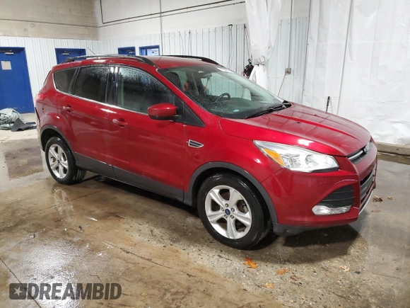 2015 Ford Escape SE with VIN 1FMCU0GX1FUC40823, listed as a Copart auction lot 45541265 with 233,829 mi miles and Salvage Title. Bid and sale history available at carsss.com. Image 4.