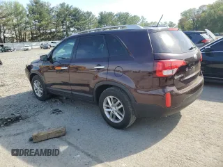 2015 Kia Sorento LX z VIN 5XYKT4A70FG581697, wystawiony jako Copart lot #54708075 z przebiegiem 81 393 mil mil oraz Szkoda całkowita • Salvage title. Historia ofert i sprzedaży dostępna na DreamBid. Obrazek 2.