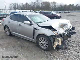 2015 Kia Optima EX with VIN 5XXGN4A75FG405216, listed as a IAAI auction lot 41794597 with 237,403 mi miles. Bid and sale history available at carsss.com. Image 1.