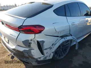 2021 BMW X6 sDrive40i z VIN 5UXCY4C06M9E16162, wystawiony jako IAAI lot #41279040 z przebiegiem 94 494 mil mil oraz . Historia ofert i sprzedaży dostępna na DreamBid. Obrazek 6.